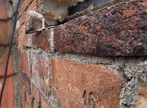 Zateplení štítové zdi, strukturovaná omitka, klempířské práce