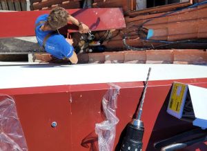 Zateplení štítové zdi, strukturovaná omitka, klempířské práce